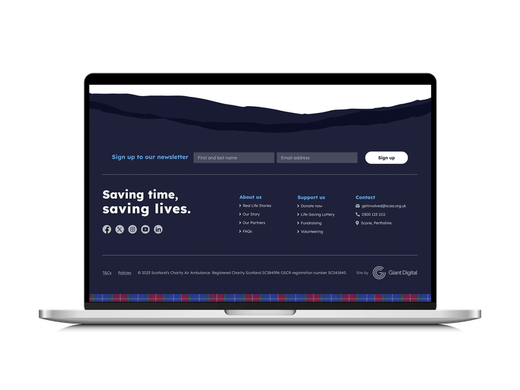 Laptop displaying the Scotland’s Charity Air Ambulance website footer, including newsletter sign-up form, social media links, navigation menus, and contact details on a dark blue and tartan background.