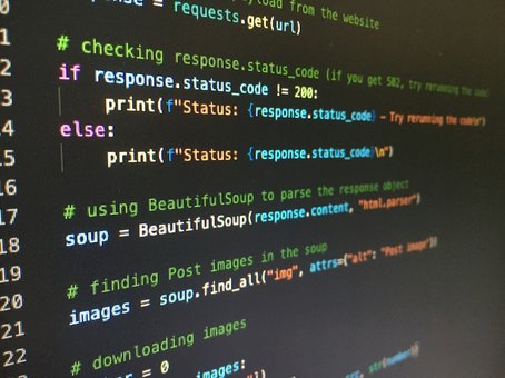 Close-up of a computer screen displaying Python code, including an if-else statement and use of the BeautifulSoup library for web scraping.