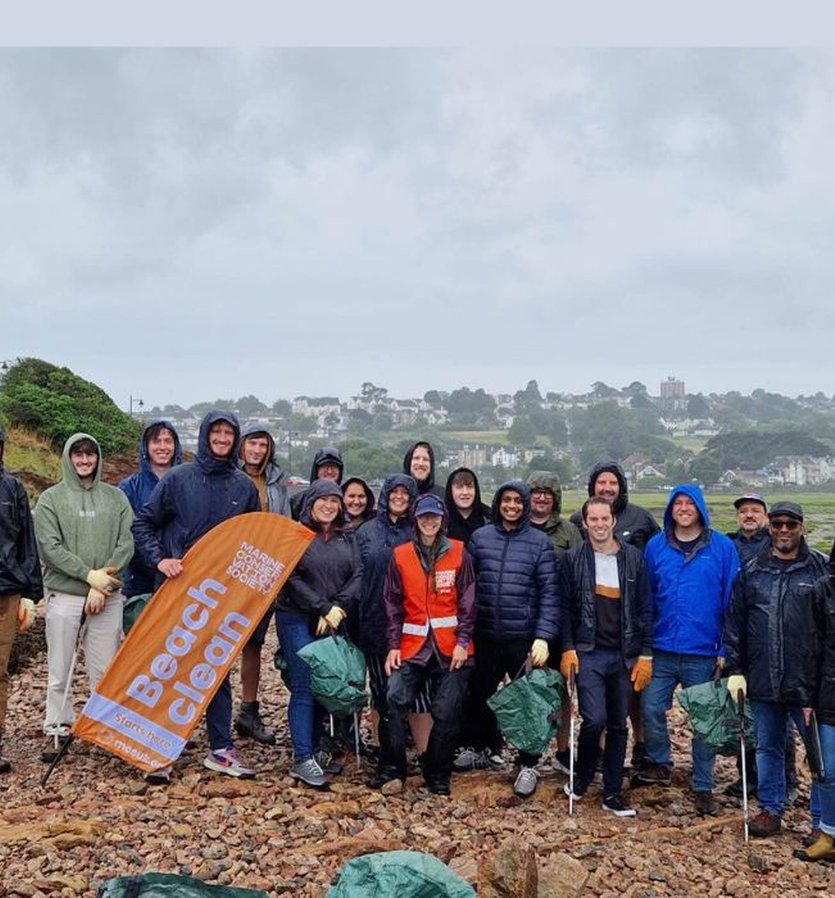 Giant Digital team smiling on a beach