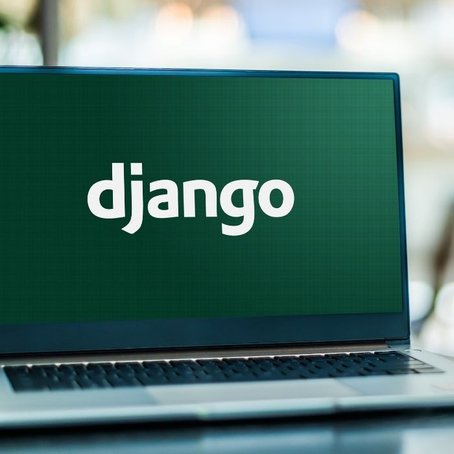 Laptop displaying the Django logo on a green screen, representing the open-source Python web framework.