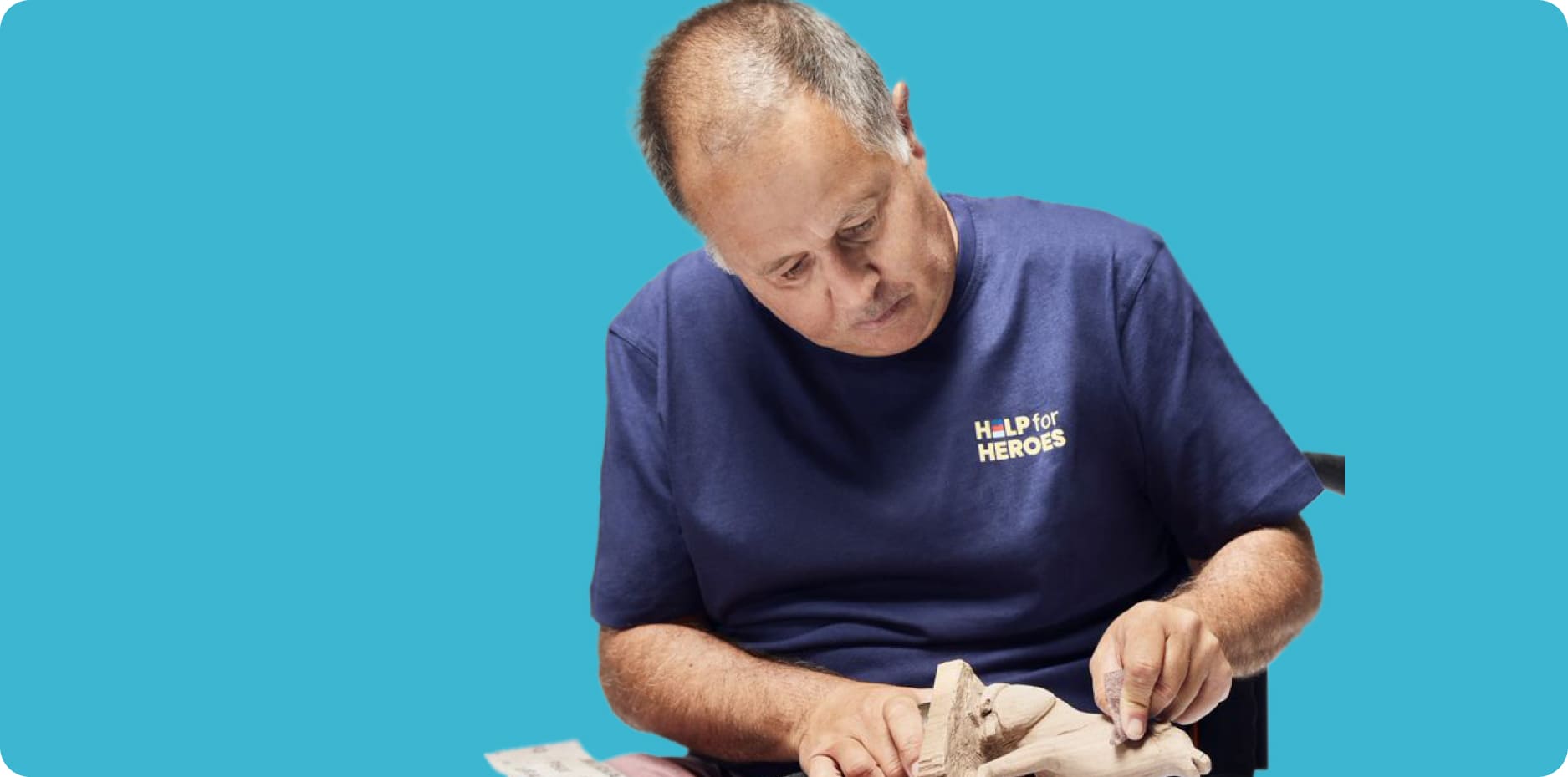 Man carving wood