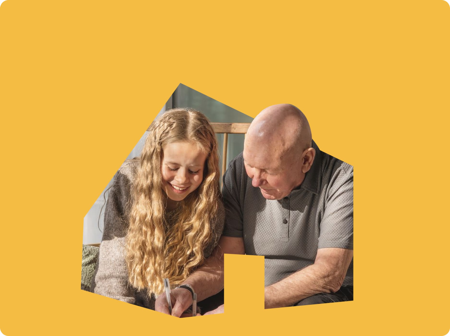 Two people smiling within a cut out of the Maggie's logo