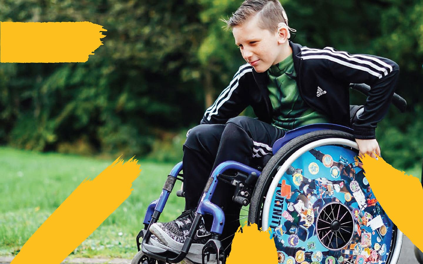 Boy in wheelchair, racing