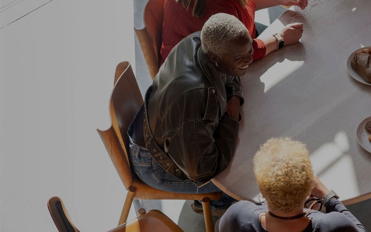 Women talking around a table